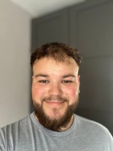 photo of male massage therapist smiling