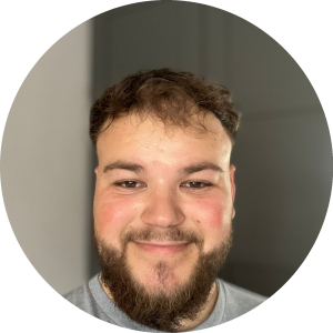 photo of male massage therapist smiling